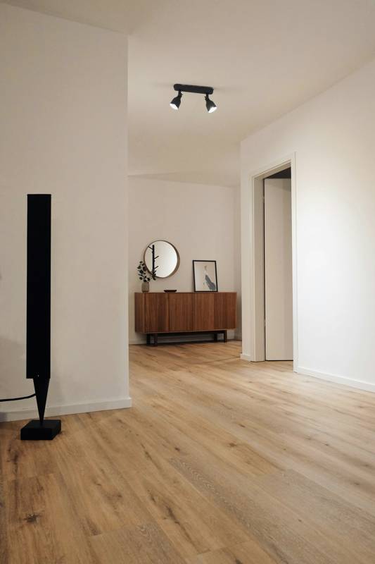Interior doorway with painted casing and baseboard